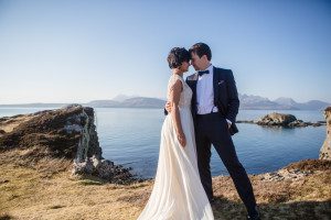 Bride and groom evening wear sunny day at Dunscaith Castle, Isle of Skye elopement