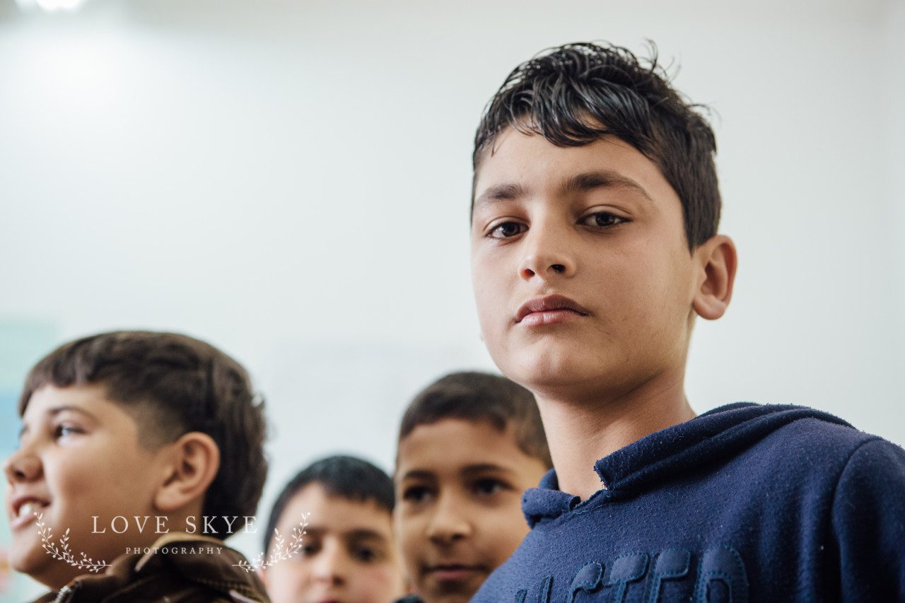 Syrian refugee boy children in a classroom in Iribid northern Jordan