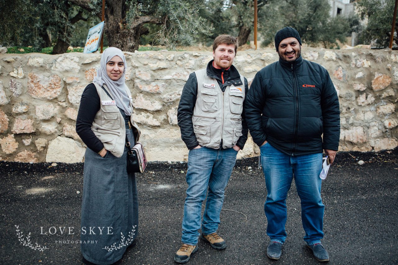 Local project workers with World Vision Jordan pictured in street in Jordanian town