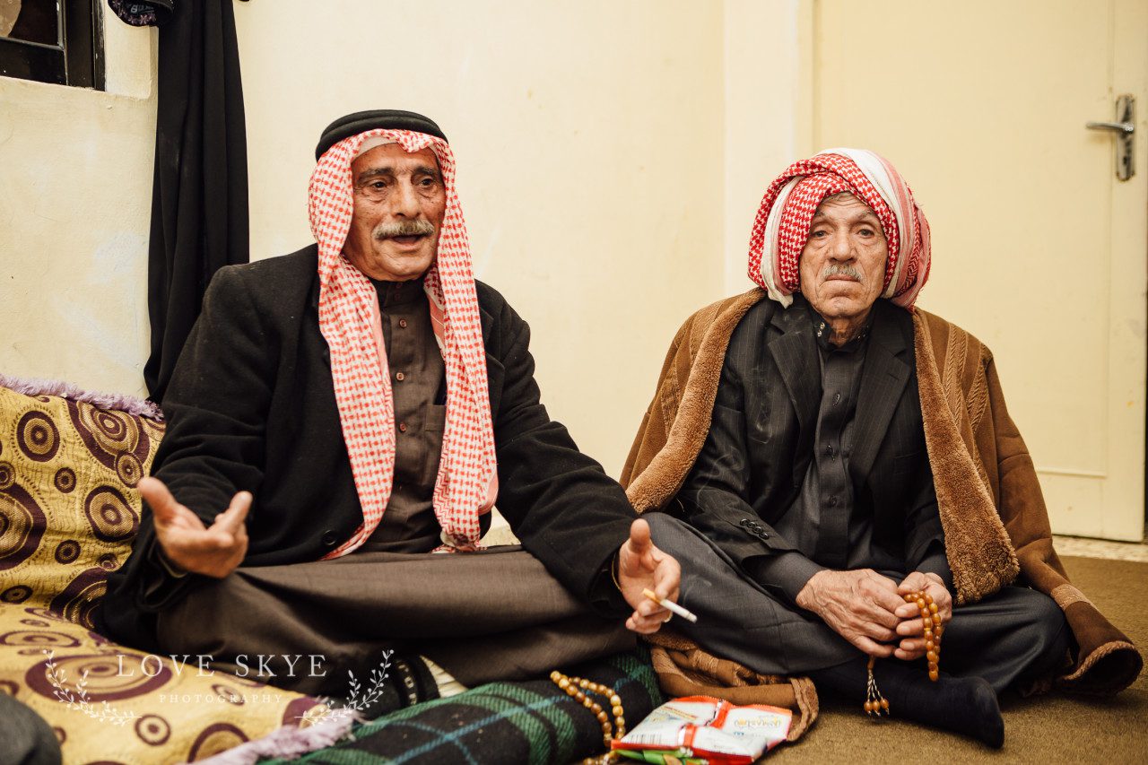 Elderly Syrian male refugees discuss life in Jordan 