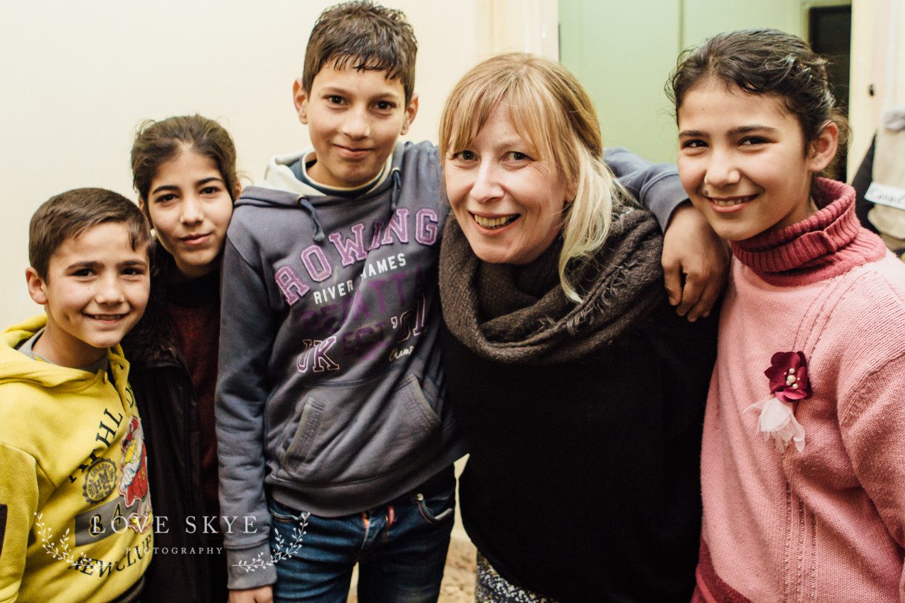 Rosie Woodhouse with Syrian refugee children in apartment northern Jordan