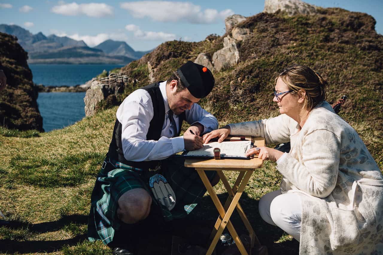 Wedding photography Cuillin ridge Dunscaith Isle of Skye signing register