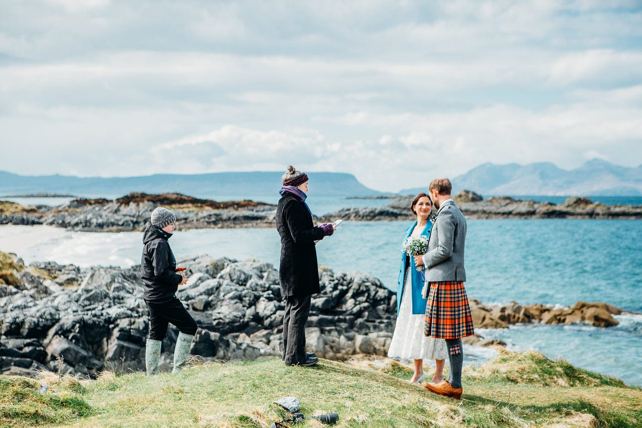 wedding ceremony at Camudarach with Arisaig and Eigg in background