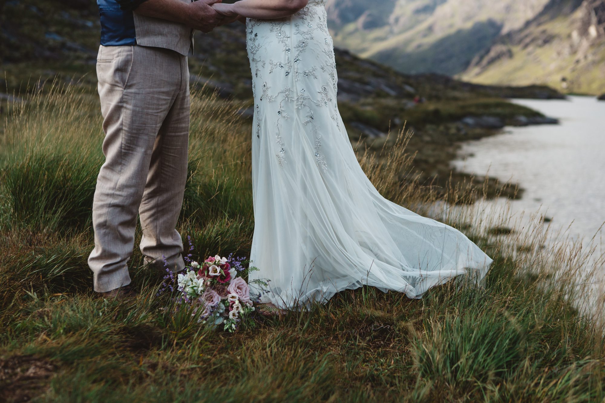 Bride and groom exchange vows during wedding ceremony loch coruisk