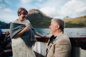 Bride and Groom chatting aboard Misty Isle boat , Sgurr na Stri behind