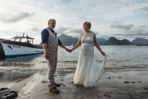 Bride and groom on beach at Elgol Misty Isle and Cuillin
