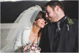 Bride and groom portraits Eilean Donan Castle views to Skye