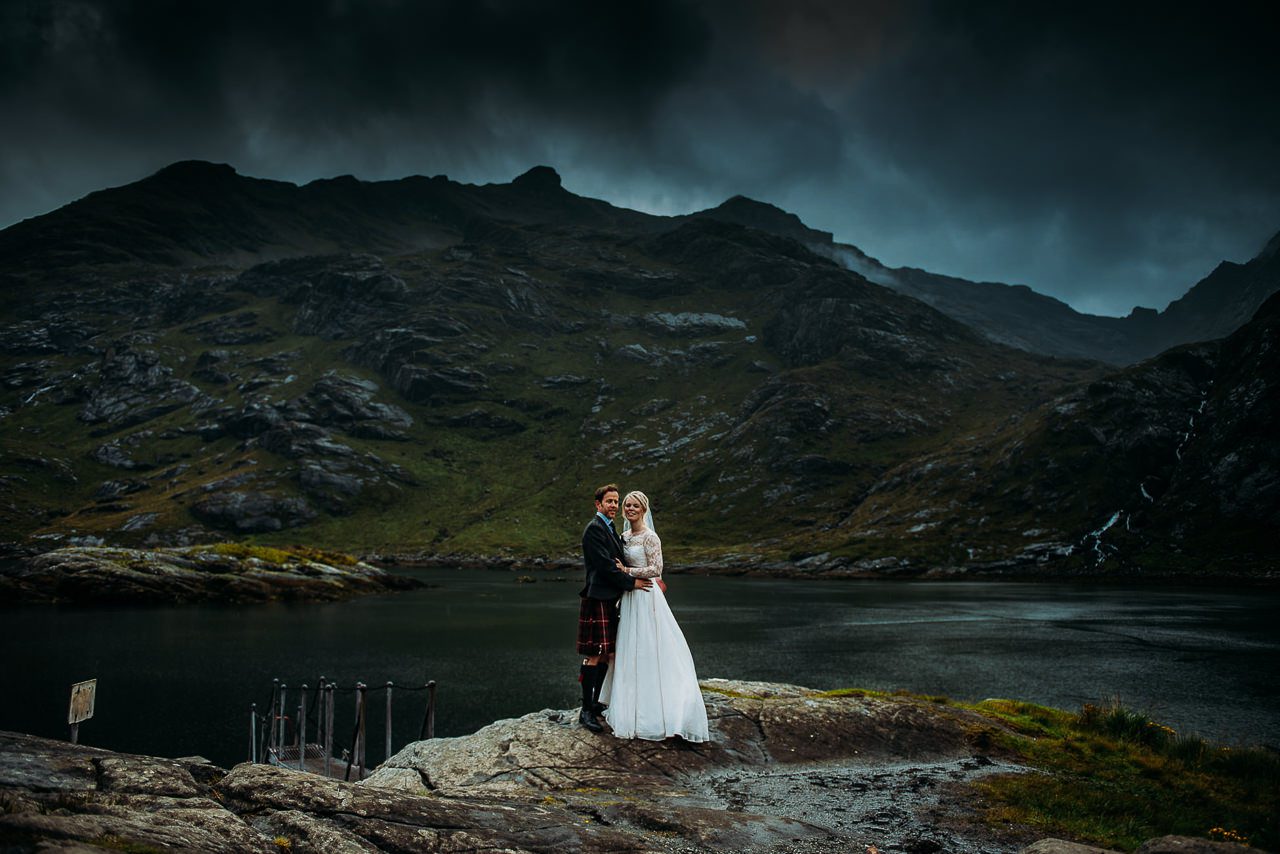 Bride and Groom at Landing steps Loch Na Culice Isle of Skye
