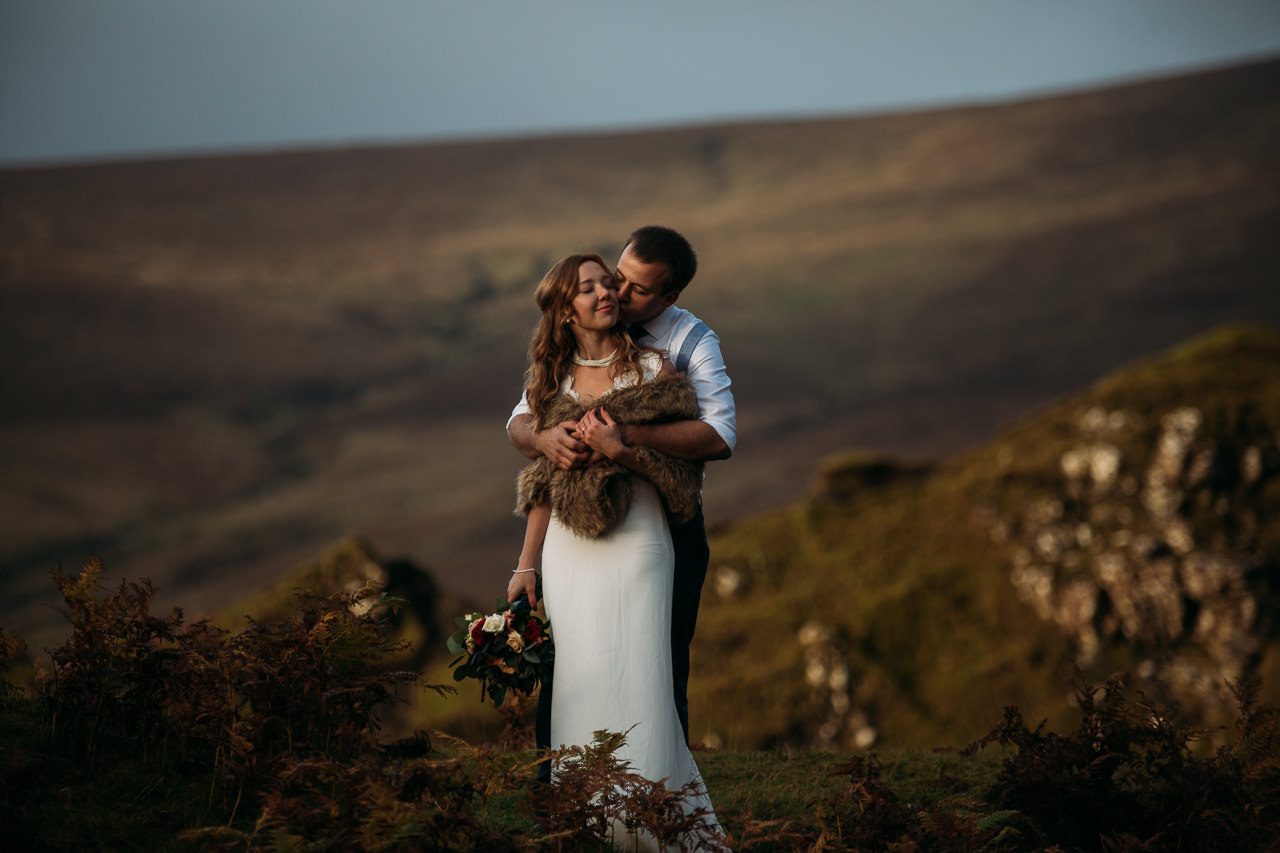 Bride and Groom embrace colours Isle of Skye
