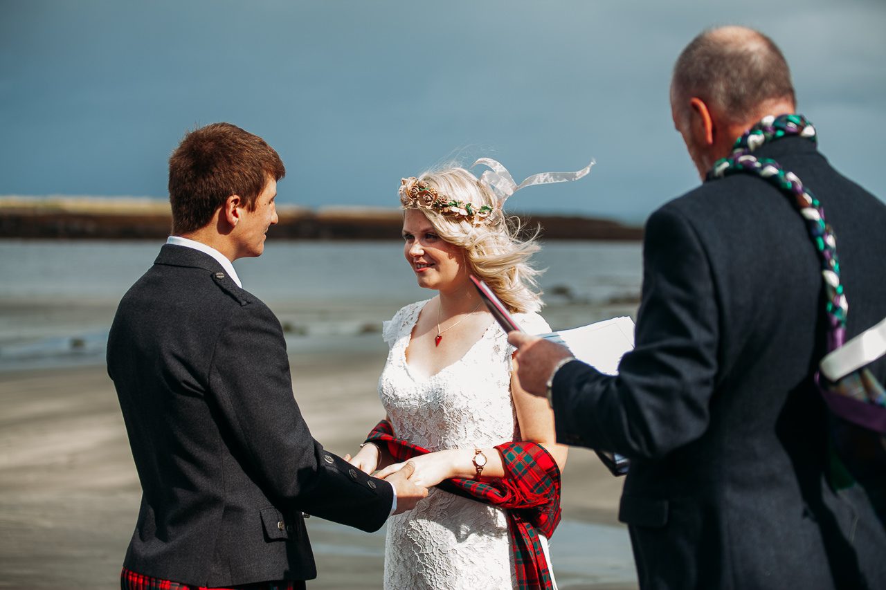 wedding ceremony bride and kilted groom Staffin beach Isle of Skye