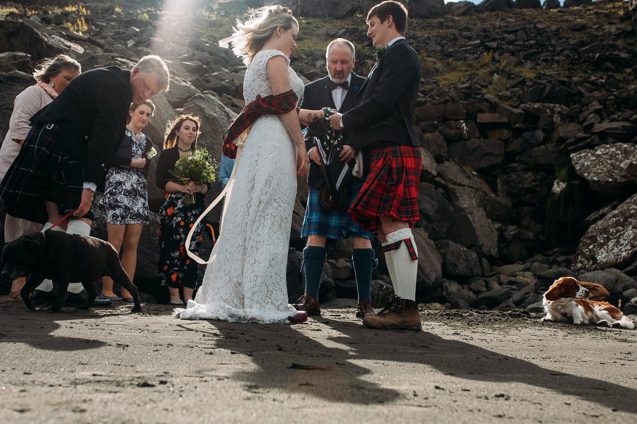 wedding ceremony bride and kilted groom Staffin beach Isle of Skye