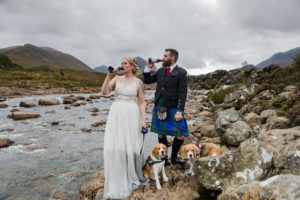 Bride and groom with beer and beagles Sligachan Isle of Skye