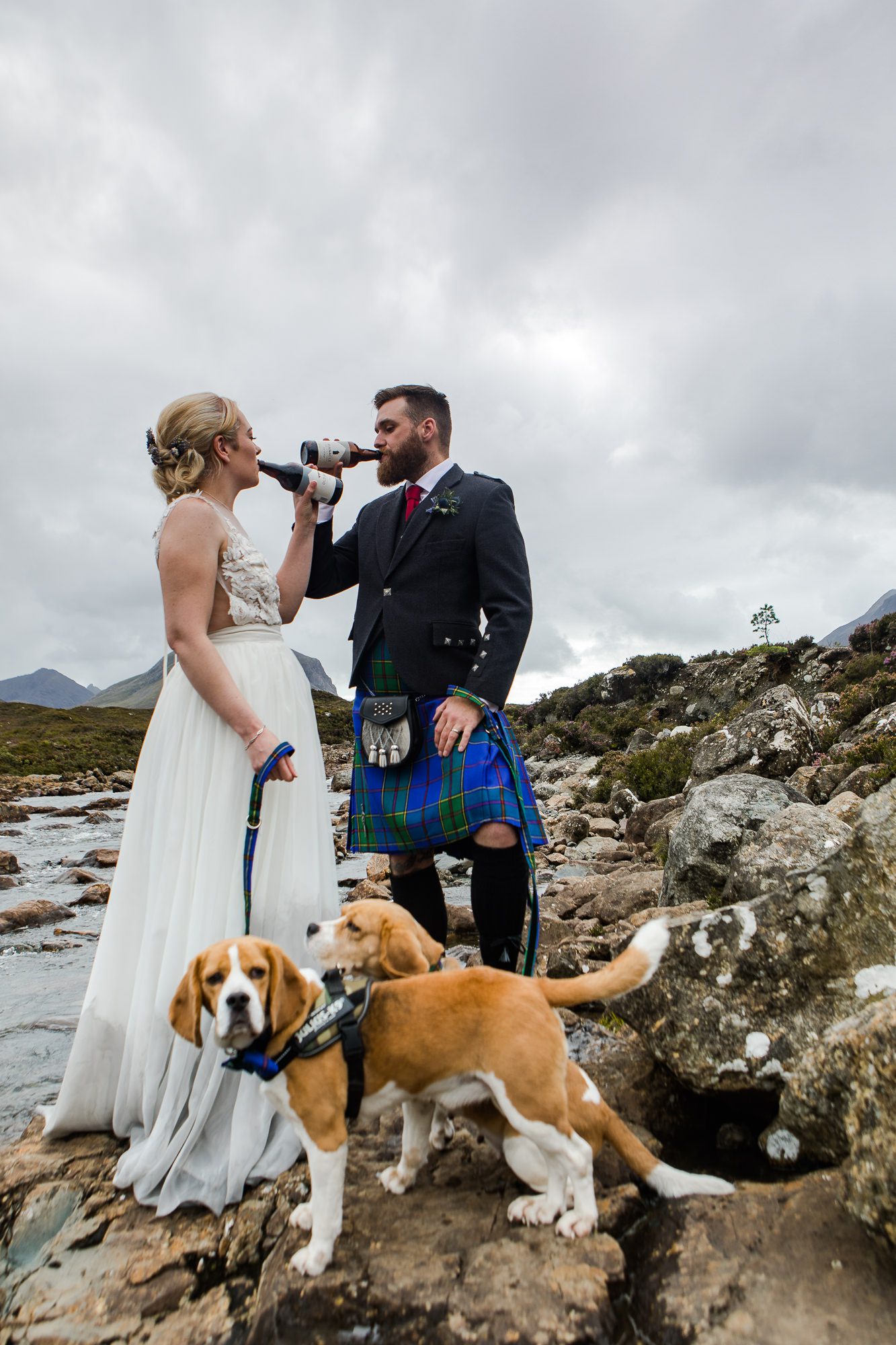 Bride and groom with beer and beagles Sligachan Isle of Skye