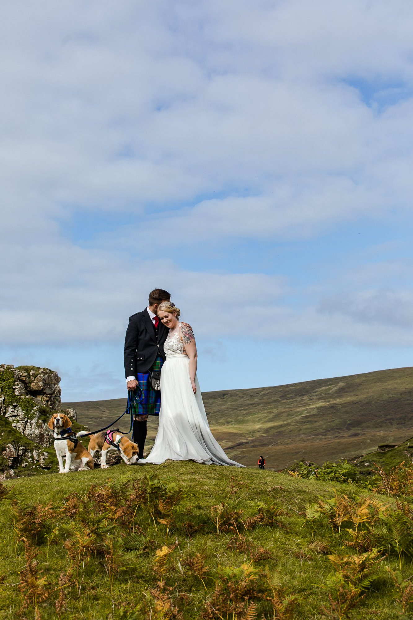 Bride and groom with beagles Isle of Skye Fairy Glen wedding