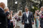 Bubbles exit Eilean Donan Castle wedding