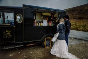 Bride and groom coffee stop Quiraing Isle of Skye