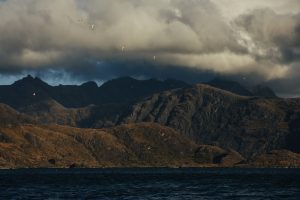 Cuillin mountain ridge from sea elopement Isle of Skye